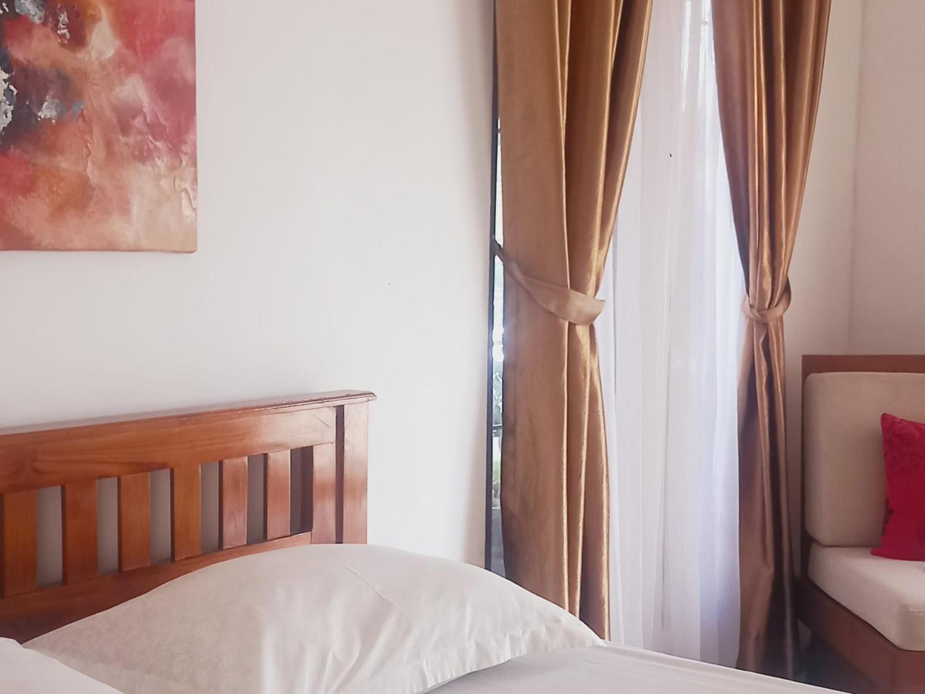 Inang Amang Homestay Labuan Bajo Quarto foto