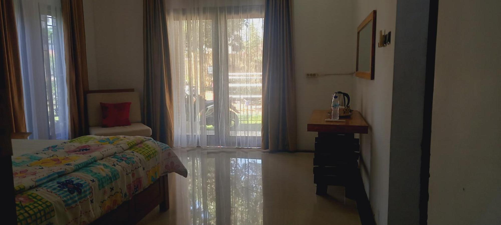 Inang Amang Homestay Labuan Bajo Quarto foto